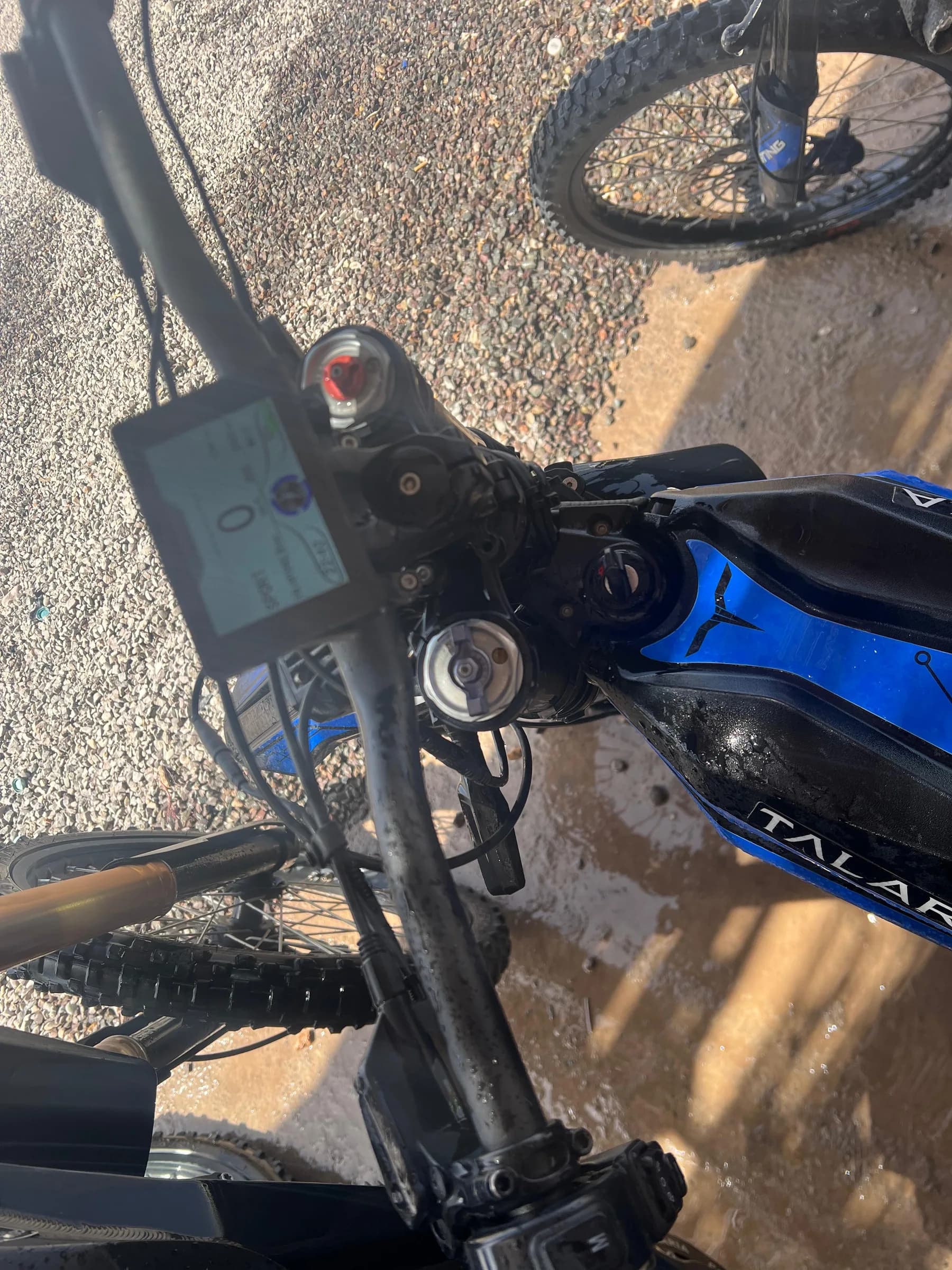Close-up of an electric dirt bike digital dashboard